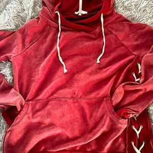 Red distressed hoodie with lace up side